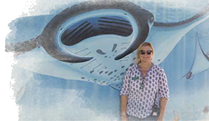 Julie in front of stingray mural
