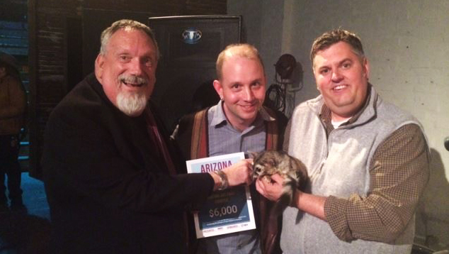 Bob, Eric, Miss Marple and Wil holding $6,000 certificate