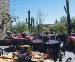 Tables prepared for an event on the Ironwood Terraces